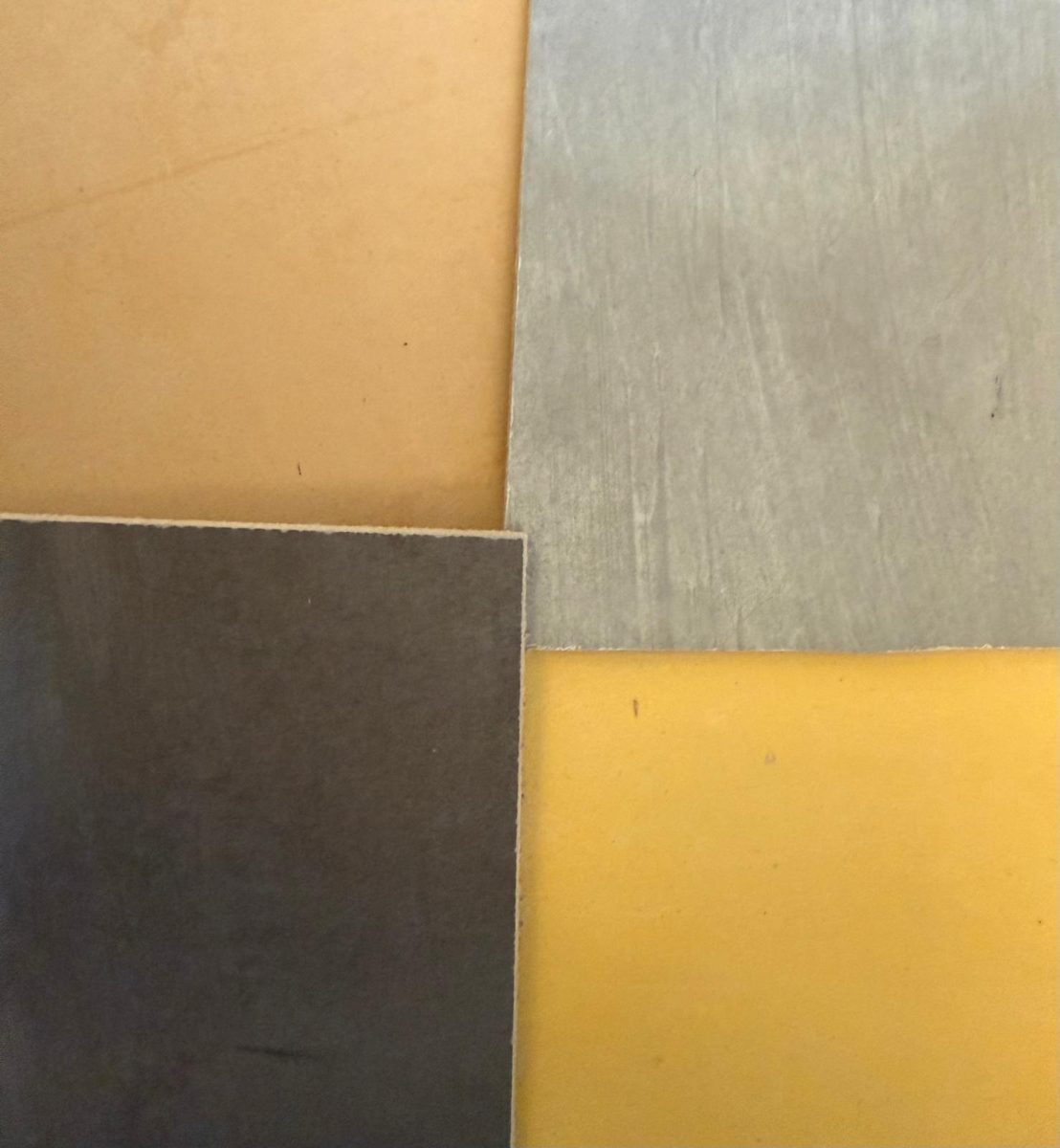 KCBerry microcement Colour Samples — four sealed sample tiles in sand, light grey, anthracite and yellow